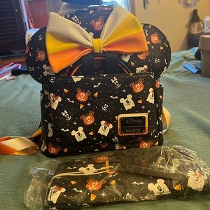 Disney loungefly Backpack matching wallet and ears.